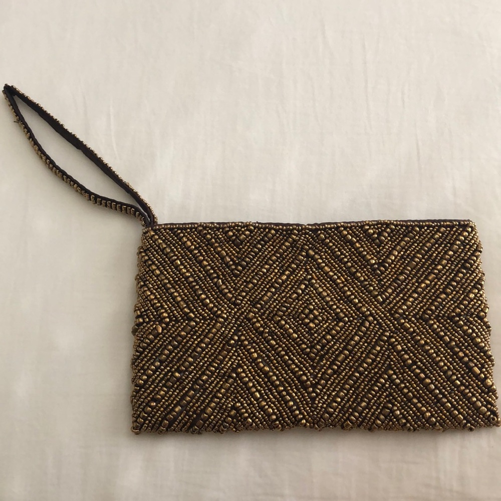 Gold beaded wristlet clutch